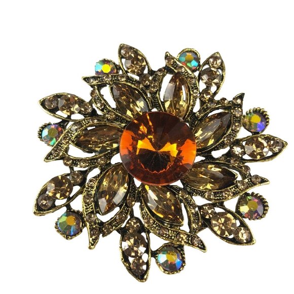 Unbranded Jewelry - Rhinestone Brooch Gold Tone Pinwheel Rivoli lower Amber & Orange
